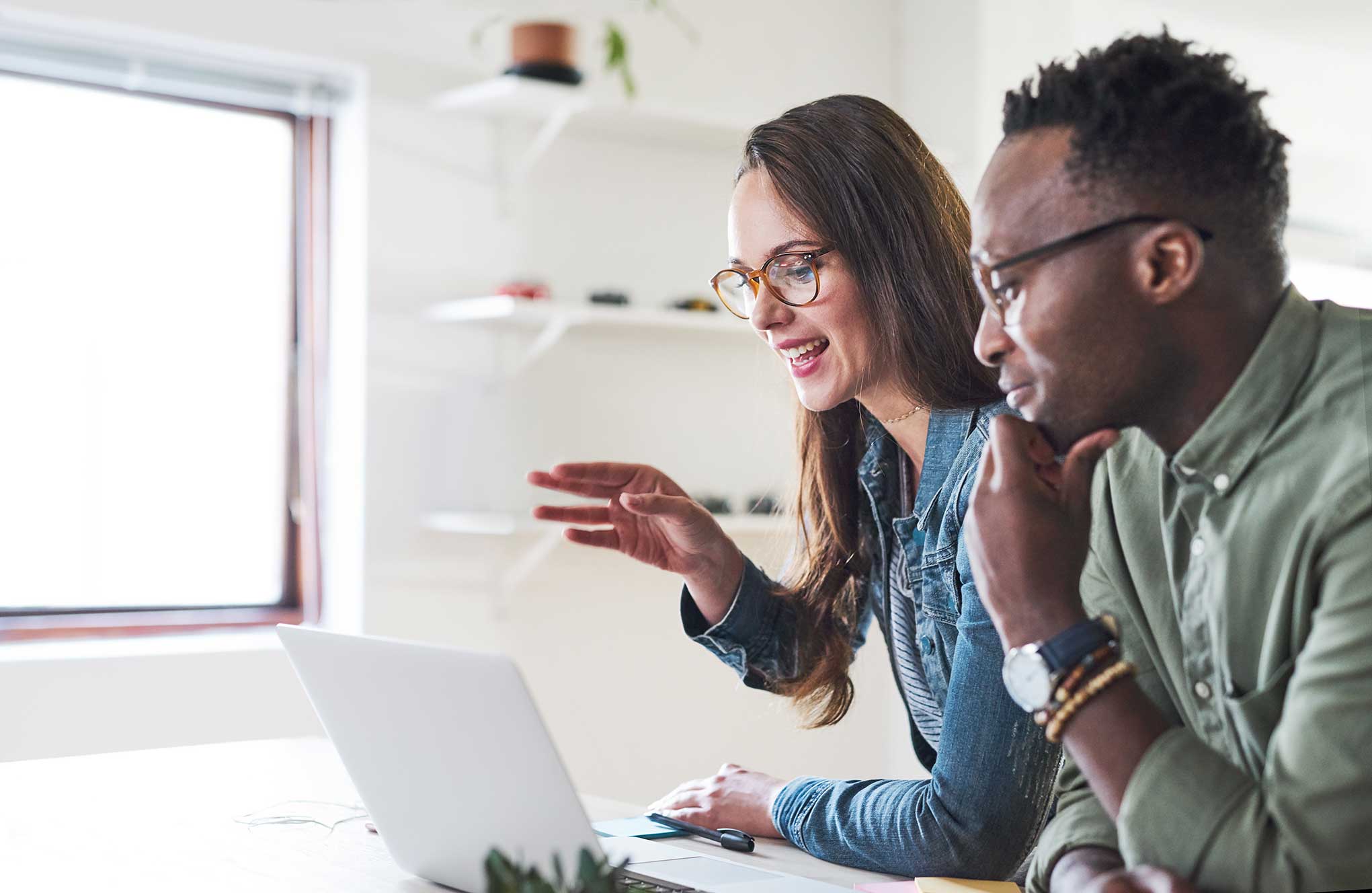 BA in Organizational Leadership Online Professionals working together in an office